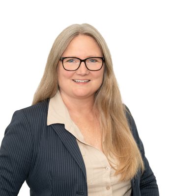 Portrait of Michelle Origer, REALTOR®.